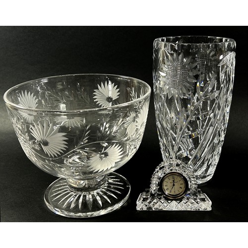 138 - A mixed selection of heavily cut glass fruit bowls, vases, a dish with cover, and a Waterford Crysta... 