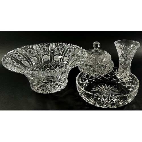 138 - A mixed selection of heavily cut glass fruit bowls, vases, a dish with cover, and a Waterford Crysta... 