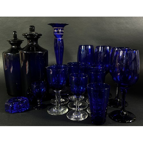 143 - A collection of Bristol Blue Glassware, including four wine glasses, eight medium size wine glasses,... 