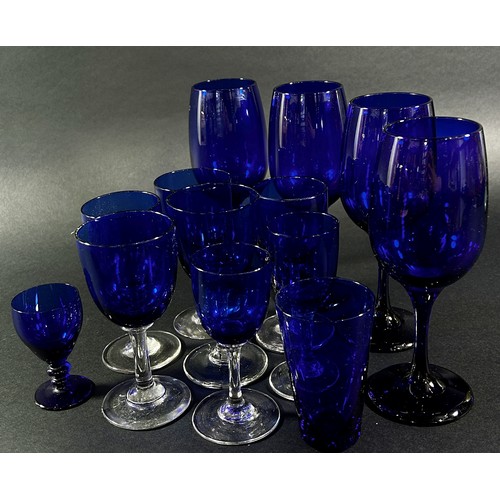 143 - A collection of Bristol Blue Glassware, including four wine glasses, eight medium size wine glasses,... 