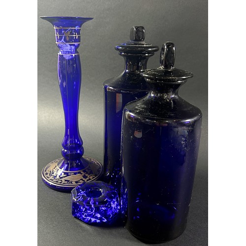 143 - A collection of Bristol Blue Glassware, including four wine glasses, eight medium size wine glasses,... 