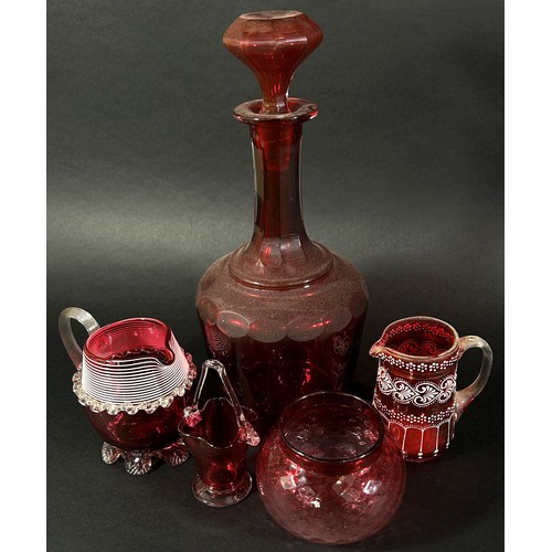 144 - A mixed selection of 19th century Cranberry glassware including a pair of claret jugs, a decanter, b... 