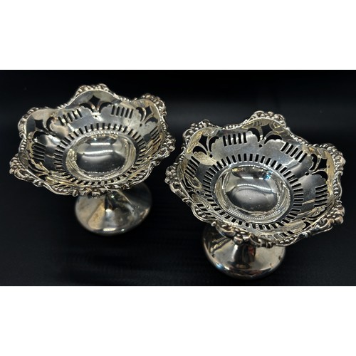 166 - A pair of silver bonbon dishes, with a floral design in original retail box from Alexandria, Chester... 