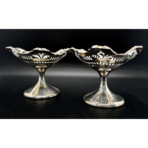 166 - A pair of silver bonbon dishes, with a floral design in original retail box from Alexandria, Chester... 