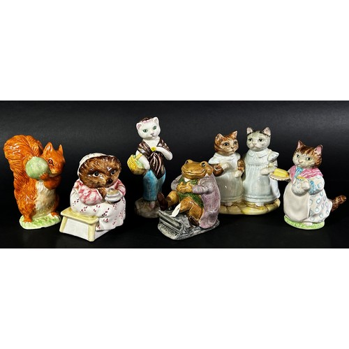 76 - A collection of Royal Albert Beatrix Potter figures with brown back stamps, together with a Crown de... 