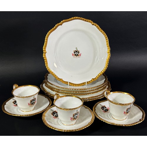 77 - A Copeland Armorial part tea/dinner service comprising two large plates, four side plates, three tea... 