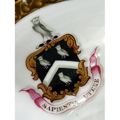 77 - A Copeland Armorial part tea/dinner service comprising two large plates, four side plates, three tea... 