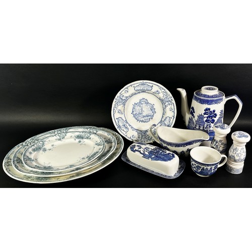 93 - A collection of blue and white china including Willow pattern and meat plates, cups saucers, plates,... 