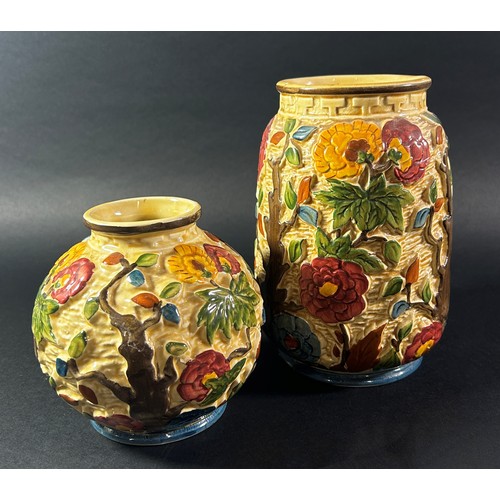 96 - A Hancock & Sons Morris ware ceramic oviform vase with floral detail, signed George Carstledge, a co... 