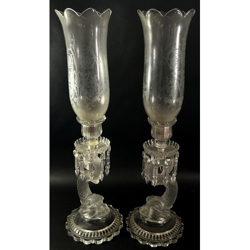 135 - A pair of Baccarat Crystal and Cut Glass Dolphin Lustre Candlesticks, each with a removable engraved... 