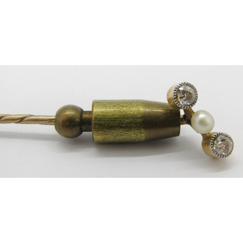 339 - Antique yellow metal millegrain set diamond and pearl stick pin, contained in a period T.&J. Perry o... 