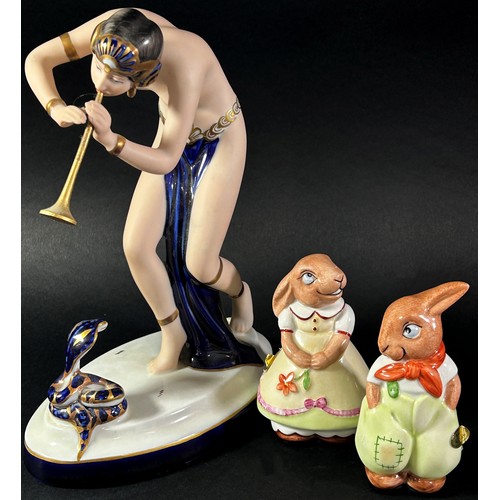Royal Dux Snake Charmer figure, together with a pair of Royal Dux Bunny's
