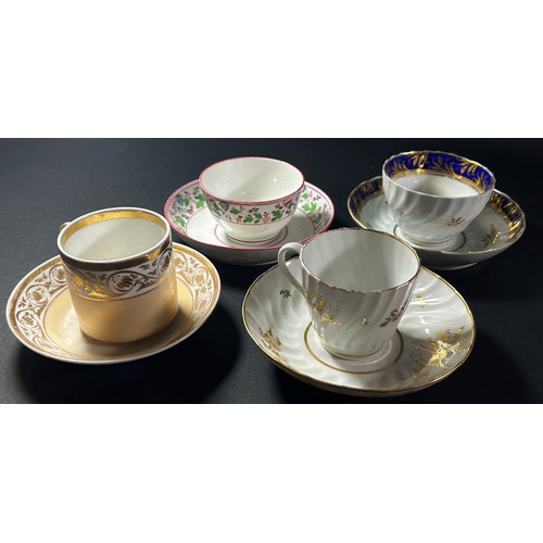 83 - A collection of late 18th century Newhall and similar porcelain tea wares comprising two shaped tea ... 