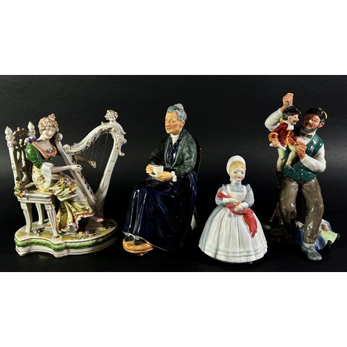 103 - A 19th century German group - female harpist, a Doulton figure - The Puppet Maker, HN2253, The Cup o... 