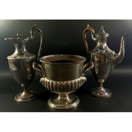 260 - A Georgian style silver plated ice bucket 19cm high, and two elegant crested Regency style coffee po... 