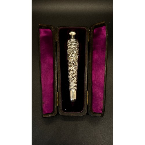 383 - A Victorian perfume bottle of cylindrical tapering form with engraved floral detail, with bespoke le... 