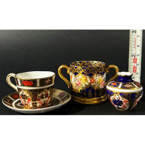 415 - Crown Derby miniature cup and saucer with rich Imari detail, further miniature vase similarly decora... 