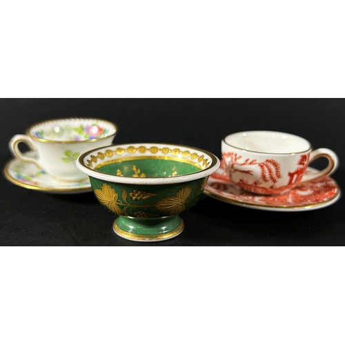 416 - A miniature Minton cup and saucer with floral garlands, further miniature Coalport ironstone red Wil... 