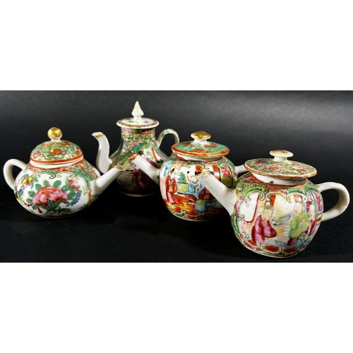 418 - Four miniature Cantonese tea and coffee pots with traditional painted finish, 7.5cm max