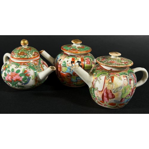 418 - Four miniature Cantonese tea and coffee pots with traditional painted finish, 7.5cm max