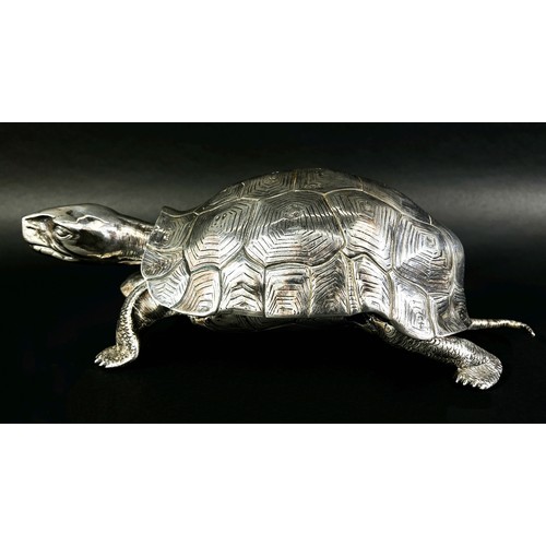 219 - A silver inkwell in the form of a life size tortoise, the shell hinged opening to reveal a glass ink... 