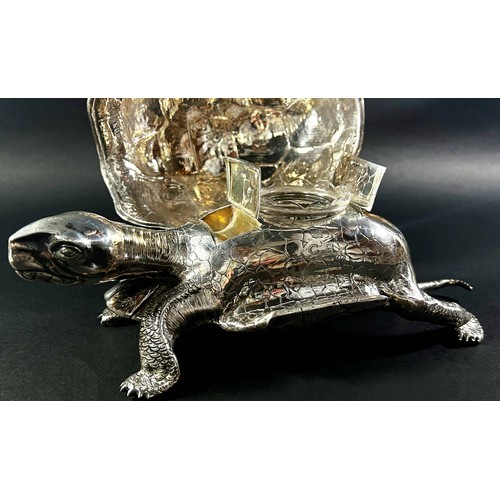 219 - A silver inkwell in the form of a life size tortoise, the shell hinged opening to reveal a glass ink... 