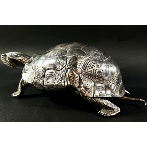 219 - A silver inkwell in the form of a life size tortoise, the shell hinged opening to reveal a glass ink... 