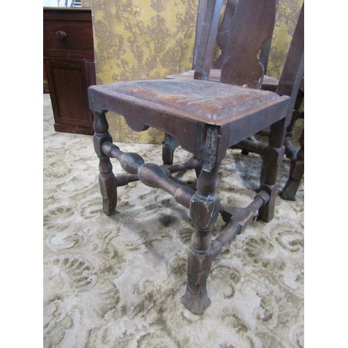 1060 - A set of four antique dining chairs with vase shaped splats and drop in seats, raised on turned and ... 