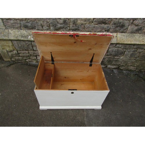 1062 - An old painted pine blanket box with later upholstered lid 48 cm high x 83 cm x 47 cm