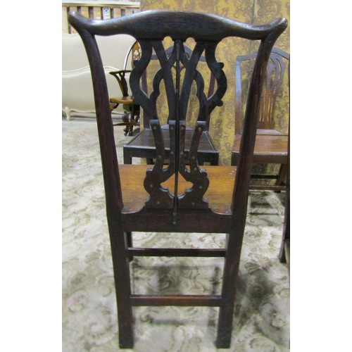 1077 - Nine Georgian oak country made dining chairs of varying design (af)