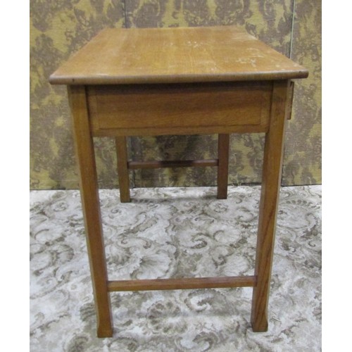 1086 - An Arts & Crafts oak side table with shallow frieze drawer raised on square cut and moulded supports... 