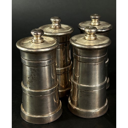 234A - A pair of silver salt mills and a pair of silver pepper mills, all stamped 925