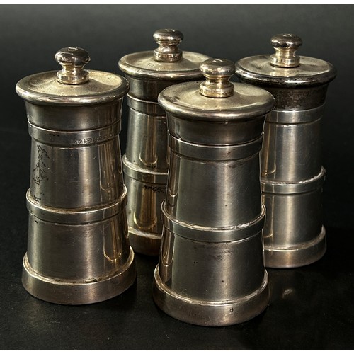 234A - A pair of silver salt mills and a pair of silver pepper mills, all stamped 925