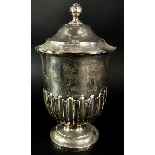 238 - A silver half gadroon trophy with a cover, Sheffield 1924 maker Martin Hall & Co, 25 cm high, 19.7 o... 