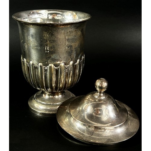 238 - A silver half gadroon trophy with a cover, Sheffield 1924 maker Martin Hall & Co, 25 cm high, 19.7 o... 