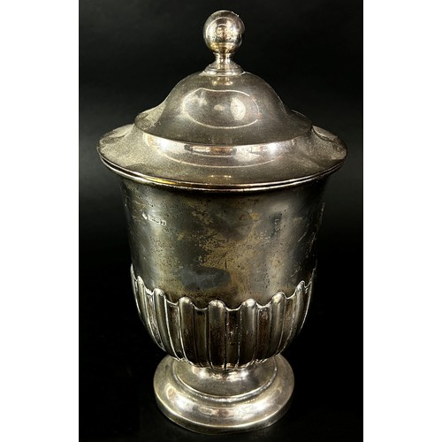 238 - A silver half gadroon trophy with a cover, Sheffield 1924 maker Martin Hall & Co, 25 cm high, 19.7 o... 