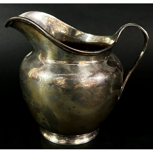 239 - A silver jug London 1919 makers mark rubbed, 12 cm high, 9.7 oz approx