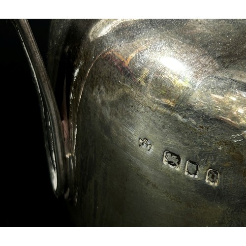 239 - A silver jug London 1919 makers mark rubbed, 12 cm high, 9.7 oz approx