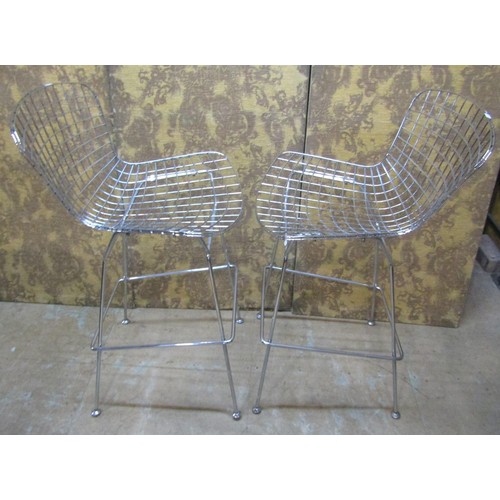 1091 - A pair of contemporary chrome Burtola style wire highchairs on splay supports