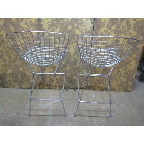 1091 - A pair of contemporary chrome Burtola style wire highchairs on splay supports