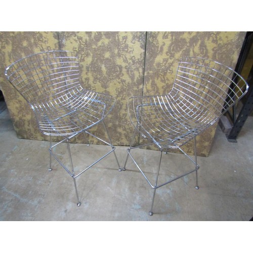 1091 - A pair of contemporary chrome Burtola style wire highchairs on splay supports