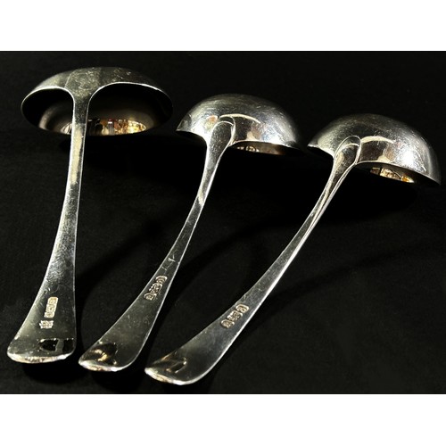 255 - A pair of Georgian silver sauce ladles, both engraved with a lion rampant, hallmarks rubbed, 15 cm l... 