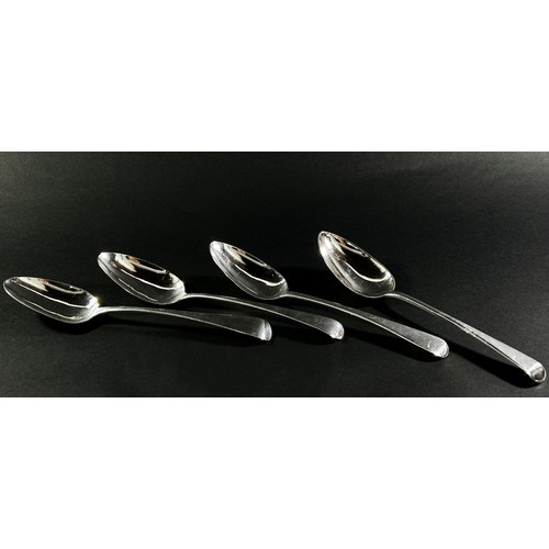 257 - Four Georgian silver serving spoons by various makers each approximately 23 cm long, 7.5 ozs approxi... 