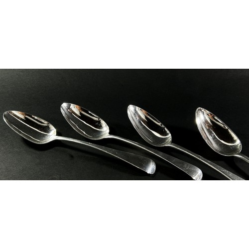 257 - Four Georgian silver serving spoons by various makers each approximately 23 cm long, 7.5 ozs approxi... 