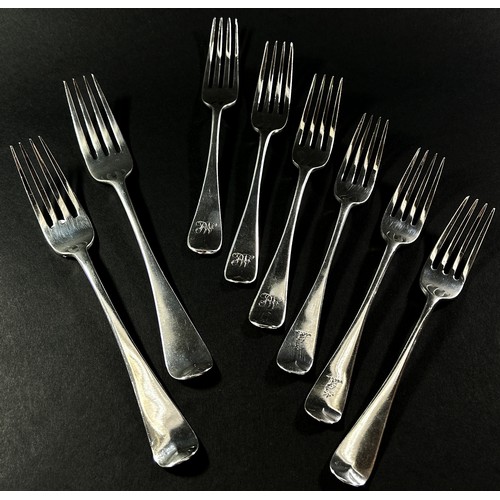 247 - Eight assorted 19th century table forks by various makers, 10.5 ozs approximately