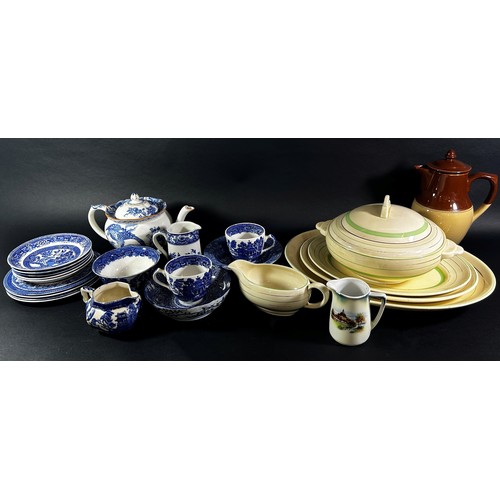 94 - A group of china items to include Clarice Cliff banded table ware in a green and gilt colourway comp... 