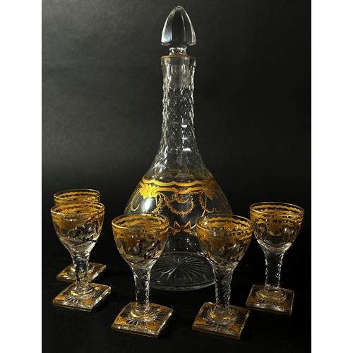 136 - An oversized brandy balloon, gilded glass decanter & 5 matching glasses, together with 2 miniature p... 