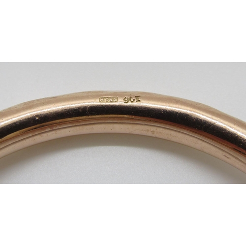 272 - 9ct faceted bangle, maker 'HG&S', 21g (dented)