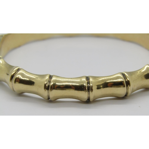 273 - 9ct hinged bamboo design bangle, maker 'RPH', Birmingham 1970, 14.4g