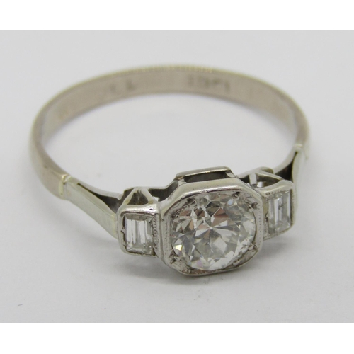 282 - Art Deco 18ct white gold three stone diamond ring, centre stone 0.65ct approx, flanked by a pair of ... 